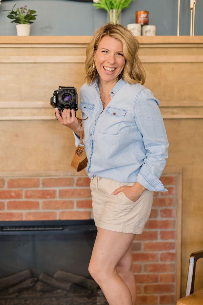 Maureen holding her camera